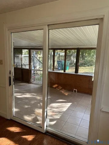 a view of an empty room and window