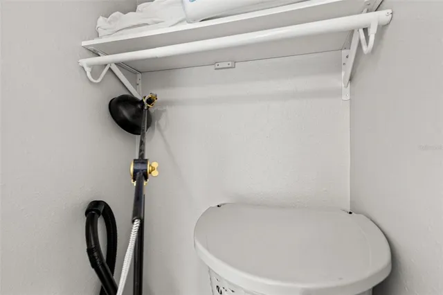 a bathroom with a toilet and a sink