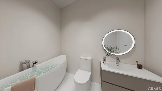 a bathroom with a toilet and a sink