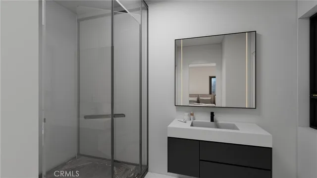 a bathroom with a sink and mirror