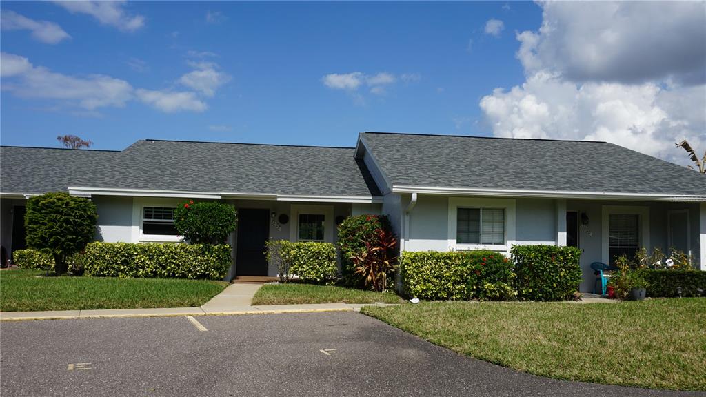 7602 Danube Drive, Unit 7602 Hudson, FL 34667 - Photo 1 of 31 a view of a house with backyard and garden