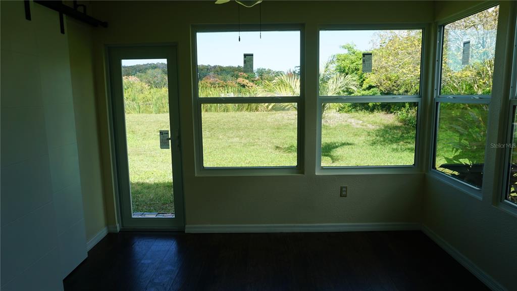 7602 Danube Drive, Unit 7602 Hudson, FL 34667 - Photo 18 of 31 a view of a large window with an outdoor space