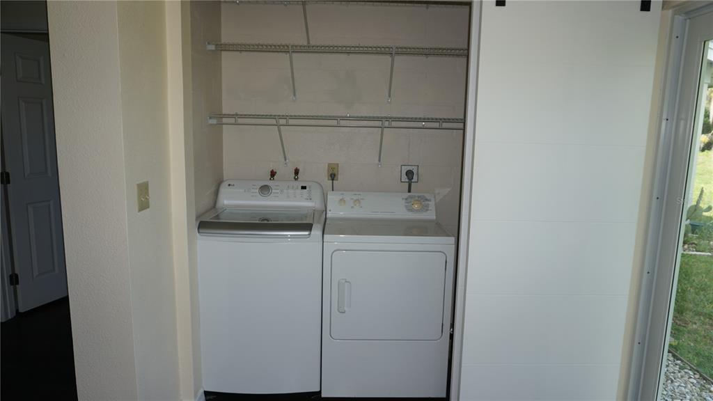 7602 Danube Drive, Unit 7602 Hudson, FL 34667 - Photo 19 of 31 a bathroom with a sink and vanity