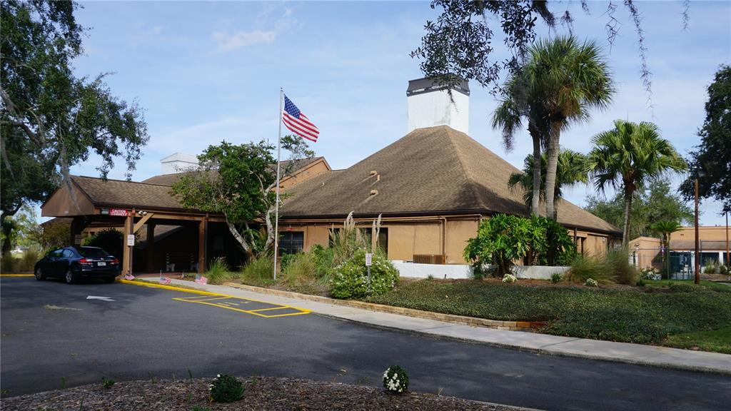 7602 Danube Drive, Unit 7602 Hudson, FL 34667 - Photo 25 of 31 front view of a house with a street