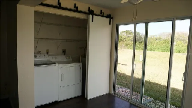 a bathroom with a sink and a large window
