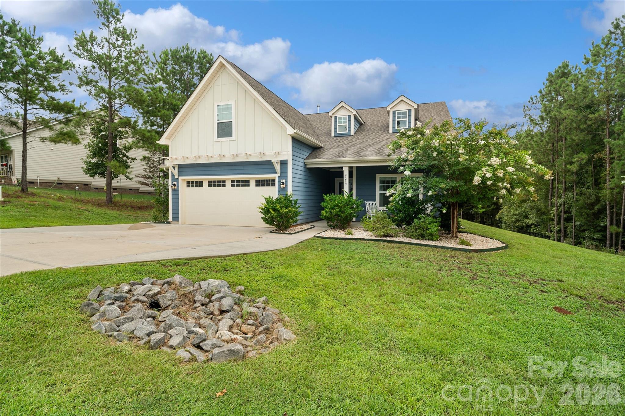5299 Admirals Landing Lancaster, SC 29720 - Photo 30 of 39 a front view of a house with garden