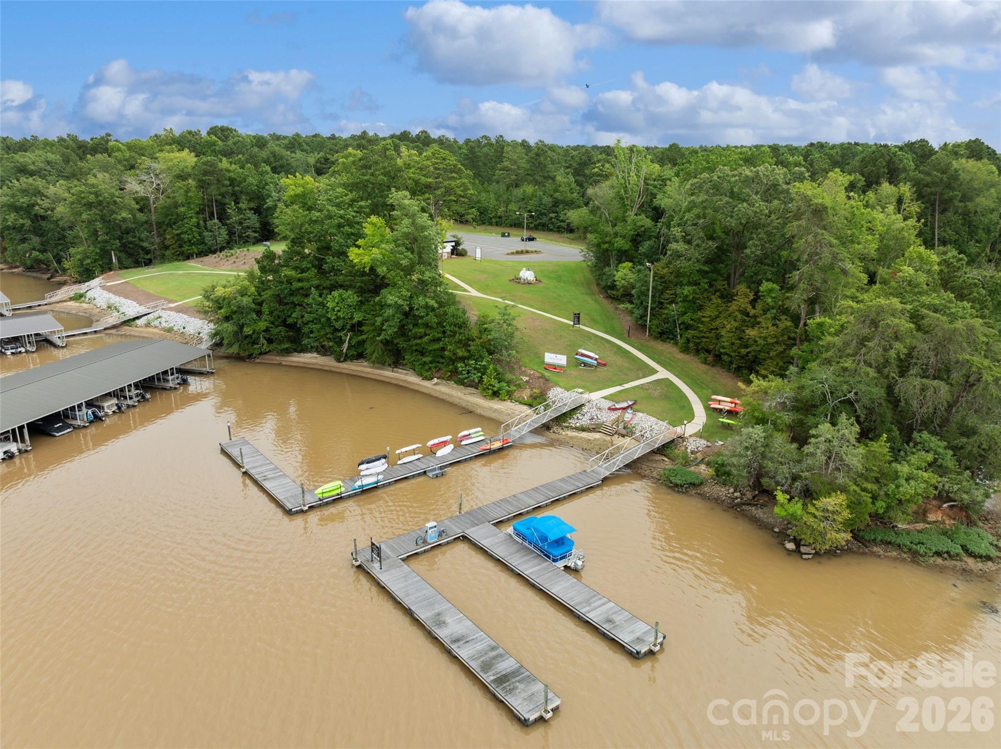 5299 Admirals Landing Lancaster, SC 29720 - Photo 34 of 39 an aerial view of a house with a yard and lake