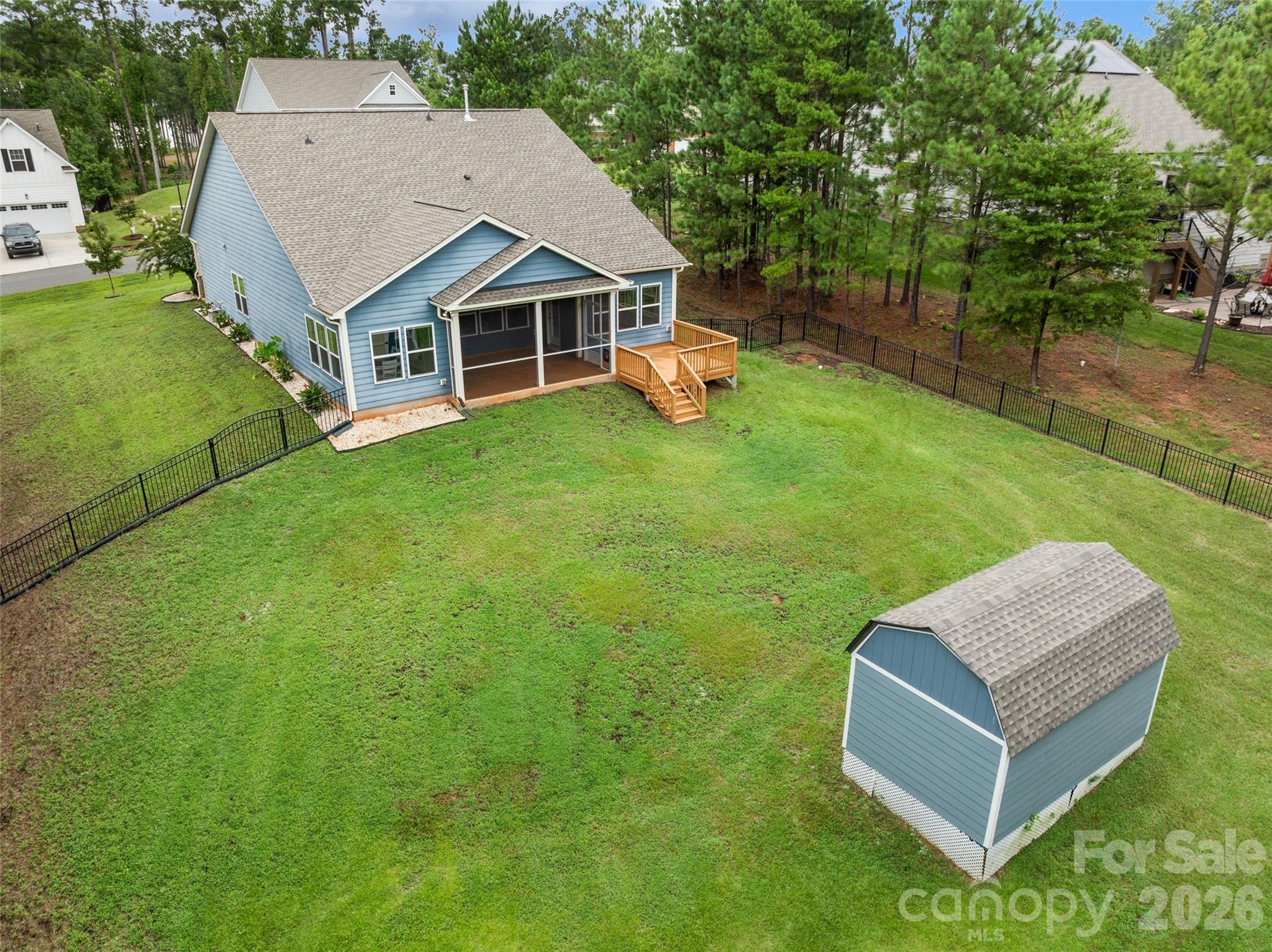 5299 Admirals Landing Lancaster, SC 29720 - Photo 36 of 39 a aerial view of a house with a yard table and chairs