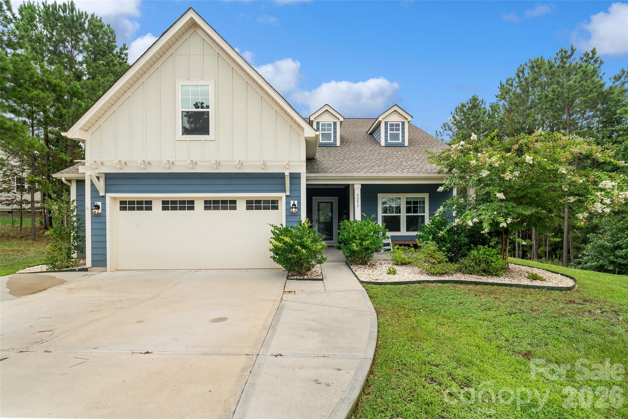 5299 Admirals Landing Lancaster, SC 29720 - Photo 39 of 39 a front view of a house with a yard and garage