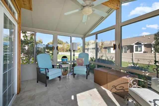 a room with lots of table and chairs