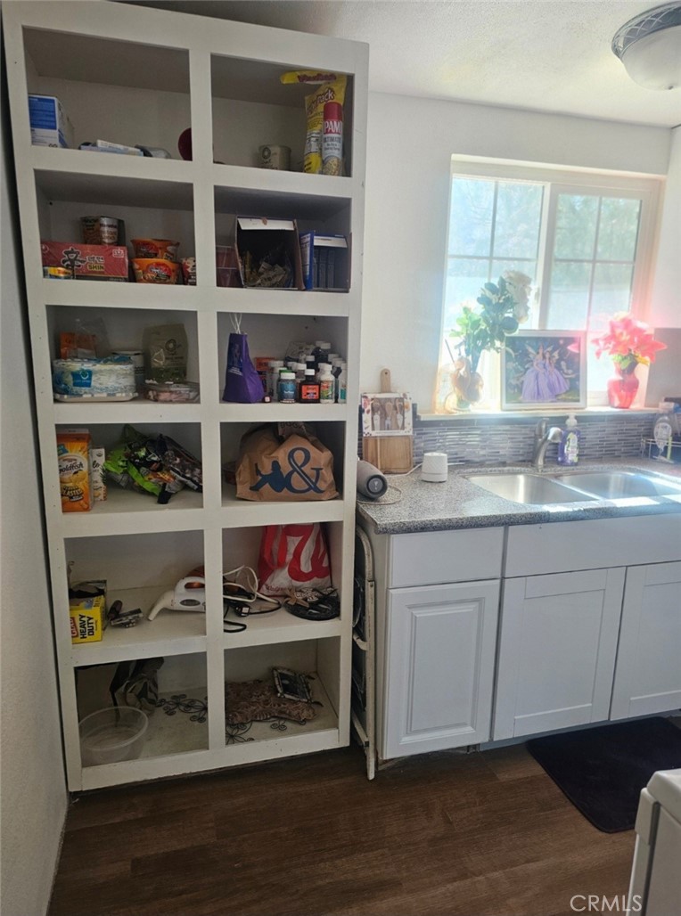 13391 Mesquite Road Whitewater, CA 92282 - Photo 4 of 17 a kitchen with an oven a cabinets and a window