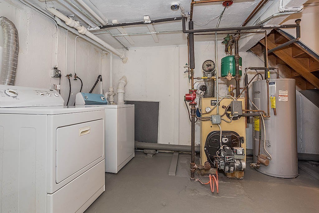 17 George Road, Unit 17 Winchester, MA 01890 - Photo 17 of 19 a utility room with dryer and washer