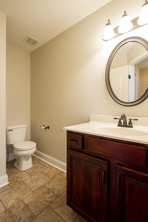 3801 Suiter Road Clarksville, TN 37040 - Photo 24 of 24 a bathroom with a sink and a mirror