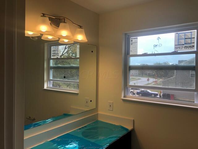 11 Thurber Road Ashville, OH 43103 - Photo 17 of 28 MASTER BATH w/QUARTZ COUNTERTOP, UNDERMOUNT BOWL SINK & LVP FLOORING