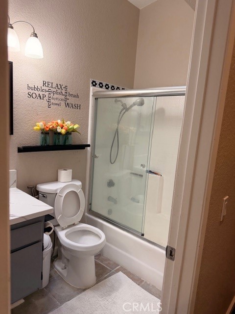 24410 Rimview Road Moreno Valley, CA 92557 - Photo 11 of 27 a bathroom with a toilet and a shower