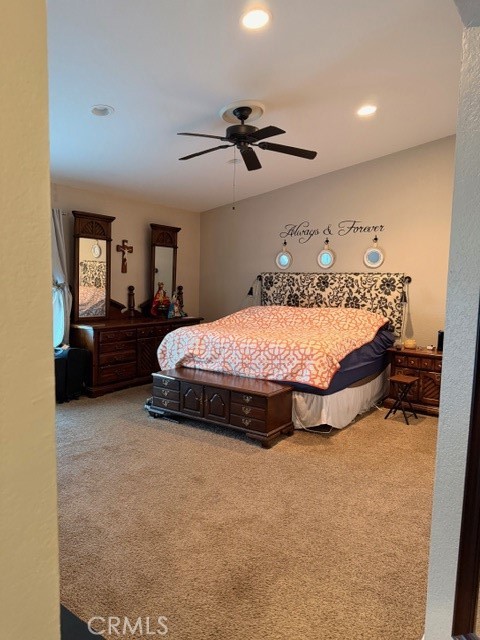 24410 Rimview Road Moreno Valley, CA 92557 - Photo 13 of 27 a bedroom with a bed and window