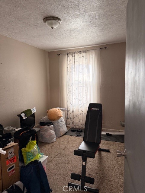 24410 Rimview Road Moreno Valley, CA 92557 - Photo 15 of 27 a living room with furniture and a window