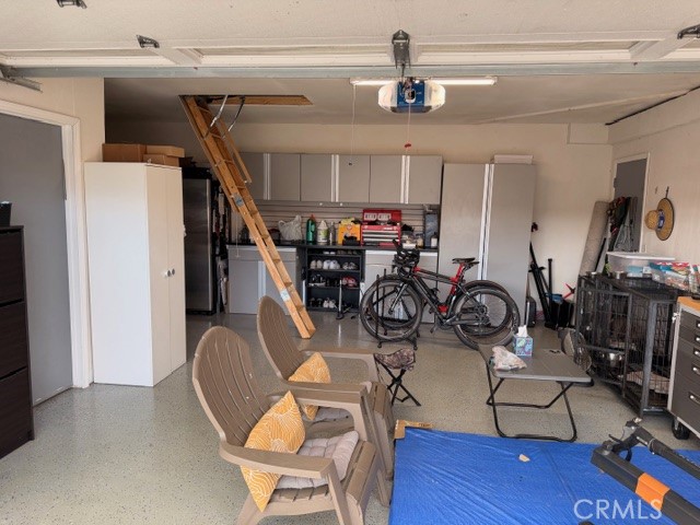 24410 Rimview Road Moreno Valley, CA 92557 - Photo 19 of 27 a view of a room with gym equipment