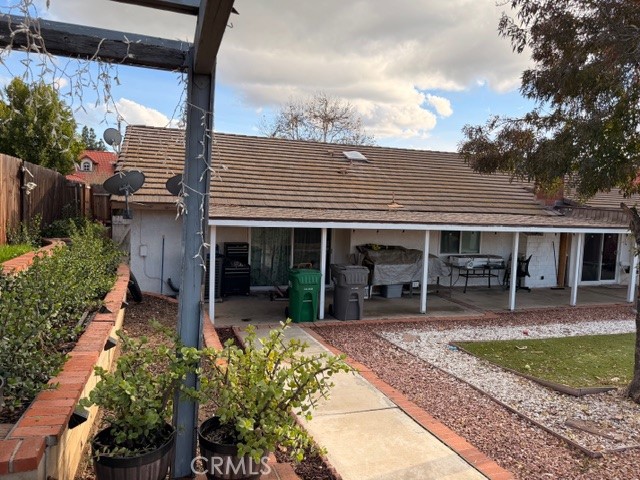 24410 Rimview Road Moreno Valley, CA 92557 - Photo 20 of 27 a front view of a house with garden