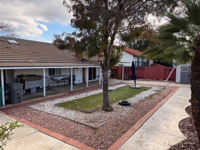 24410 Rimview Road Moreno Valley, CA 92557 - Photo 21 of 27 a front view of a house with garden