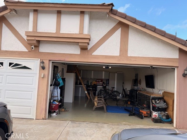 24410 Rimview Road Moreno Valley, CA 92557 - Photo 3 of 27 a view of a storage room with furniture and closet