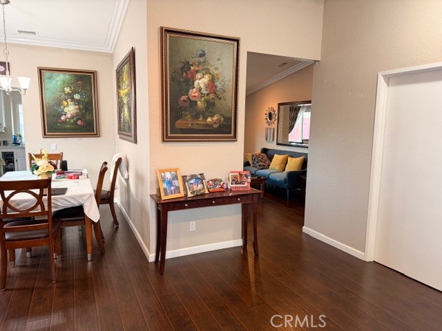 24410 Rimview Road Moreno Valley, CA 92557 - Photo 5 of 27 a living room with furniture and wooden floor