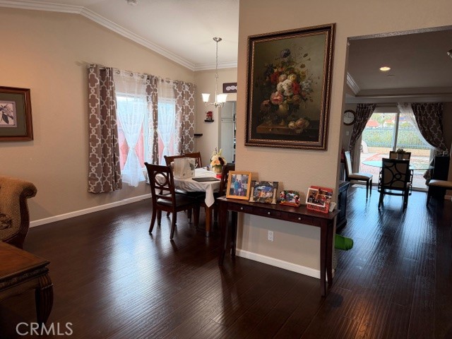 24410 Rimview Road Moreno Valley, CA 92557 - Photo 8 of 27 a living room with furniture and wooden floor