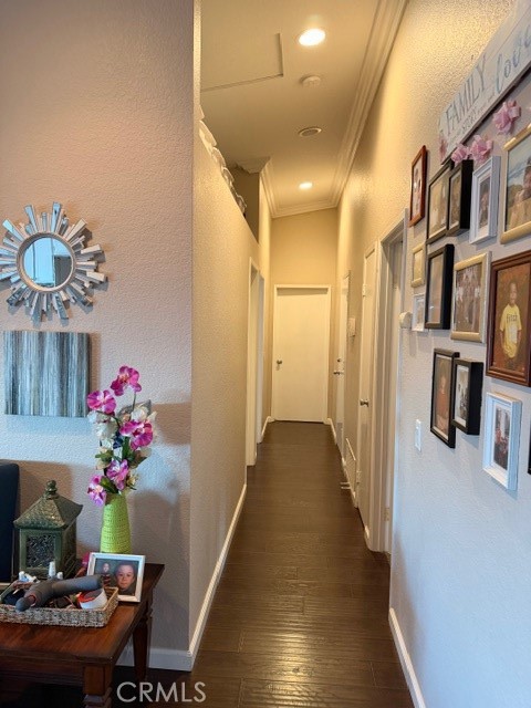 24410 Rimview Road Moreno Valley, CA 92557 - Photo 9 of 27 a hallway with furniture and flowers
