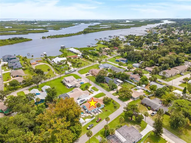 a view of a lake with sitting area