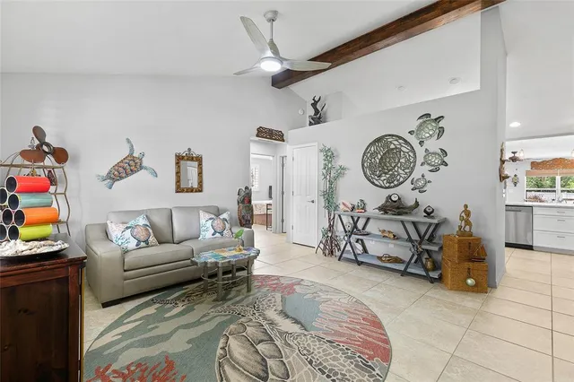 a kitchen with stainless steel appliances kitchen island granite countertop a sink and cabinets