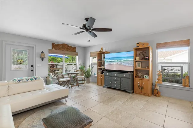 a living room with furniture and a window