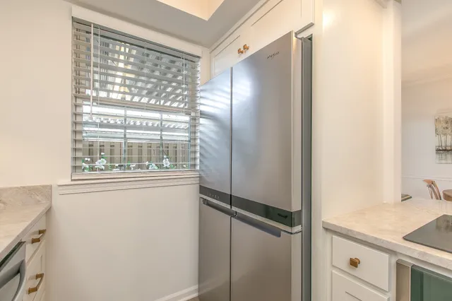 a bathroom with a shower and a sink