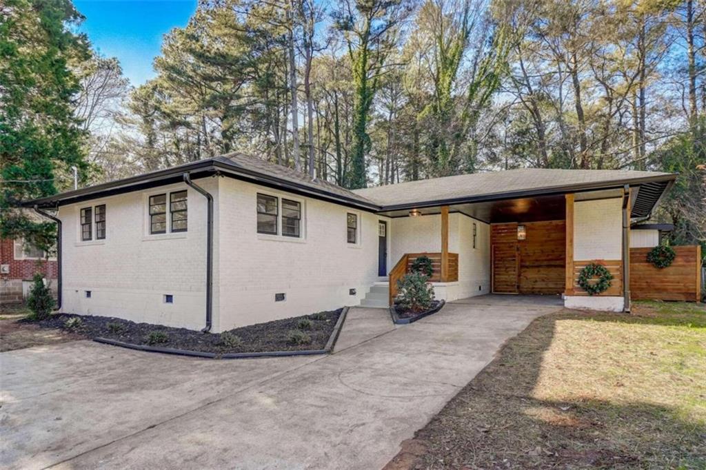1875 Derrill Drive Decatur, GA 30032 - Photo 1 of 1 a view of a house with a yard