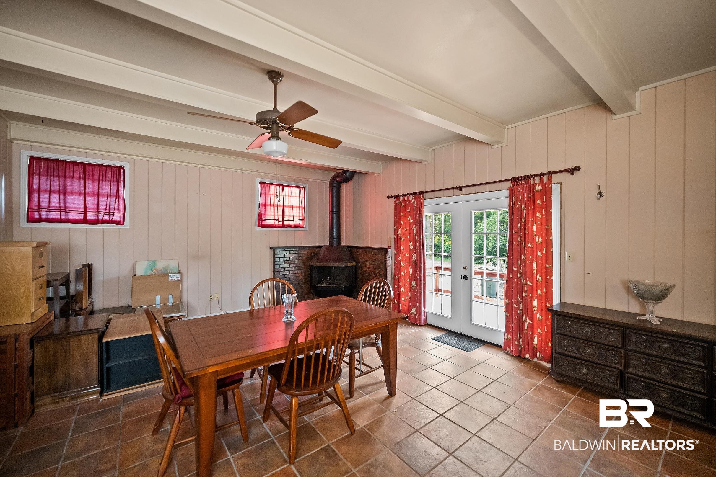 135 Pineridge Road Daphne, AL 36526 - Photo 7 of 19 Spacious room featuring exposed ceiling beams, a ceiling fan, and ceramic tile flooring