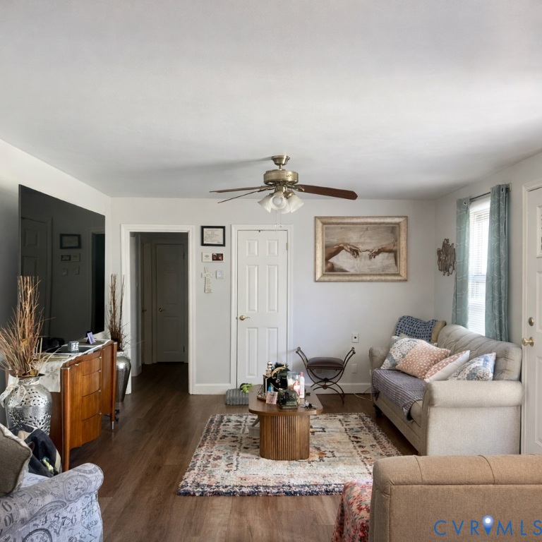 8054 Shady Grove Road Mechanicsville, VA 23111 - Photo 11 of 16 a living room with furniture and a flat screen tv