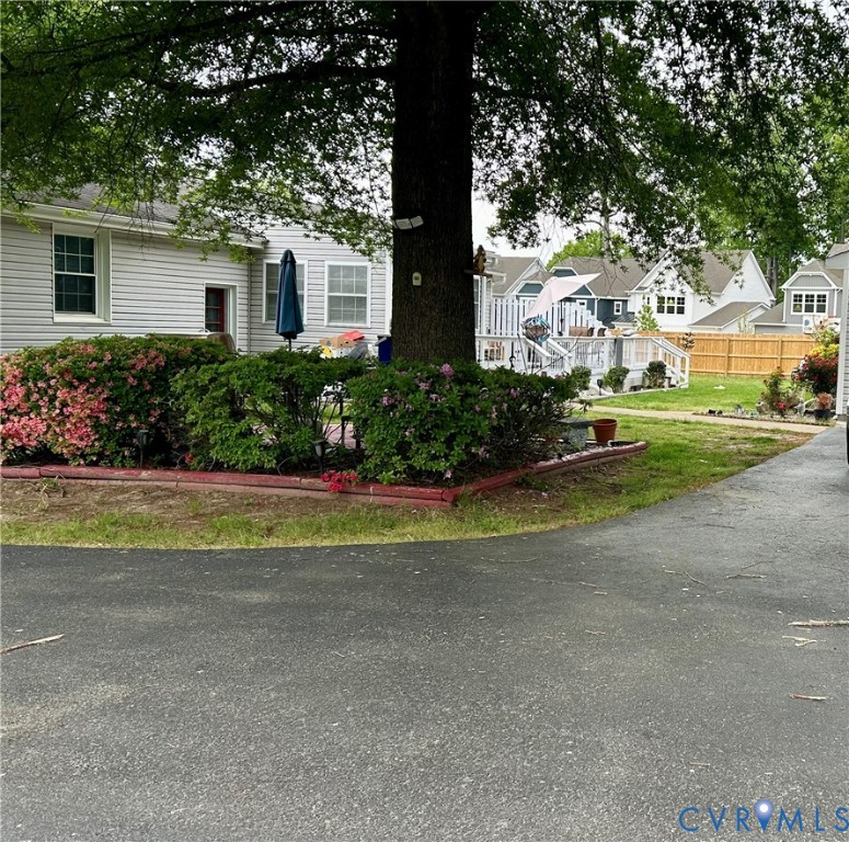 8054 Shady Grove Road Mechanicsville, VA 23111 - Photo 3 of 16 a front view of house with yard and green space