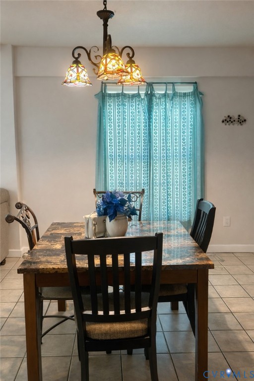 8054 Shady Grove Road Mechanicsville, VA 23111 - Photo 8 of 16 a view of a dining room with furniture and chandelier