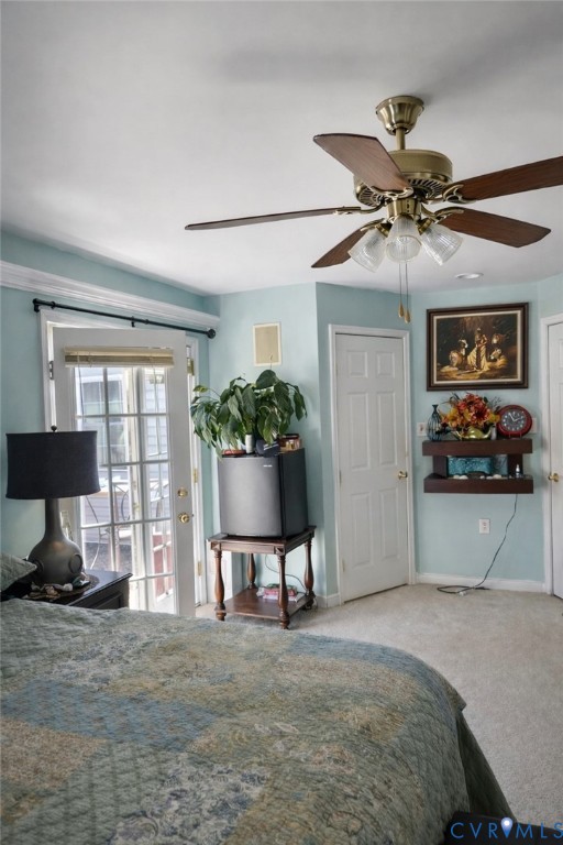 8054 Shady Grove Road Mechanicsville, VA 23111 - Photo 10 of 16 a bedroom with a bed and a potted plant