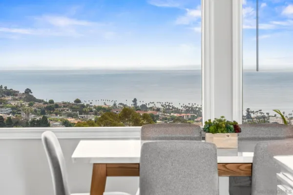 a large kitchen with a stove and cabinets