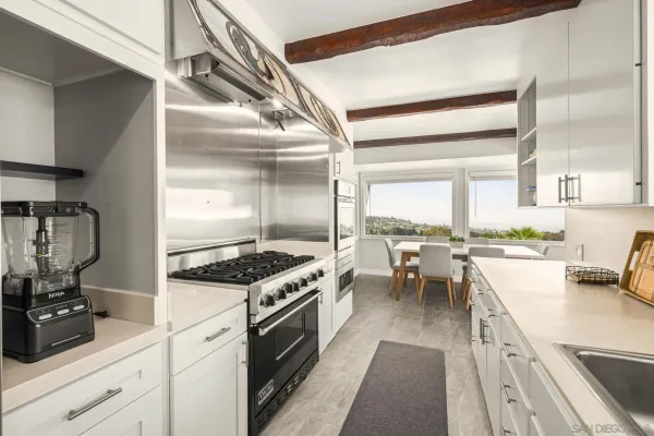 a large bed sitting in a bedroom and closet