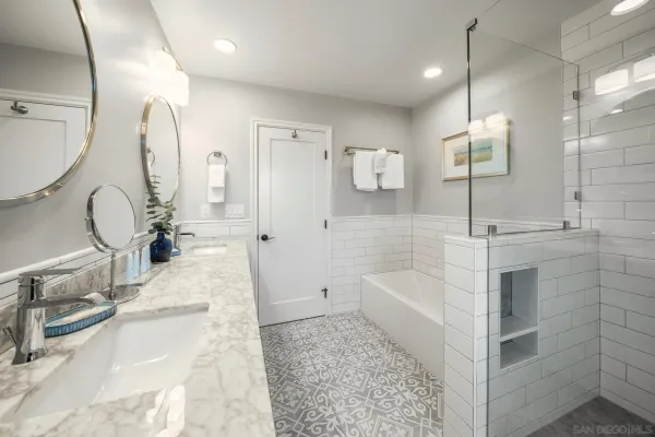 a view of a house with backyard sitting area and garden