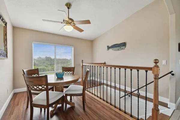 a view of a dining room with furniture