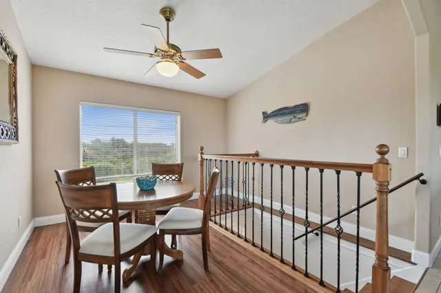 a view of a dining room with furniture