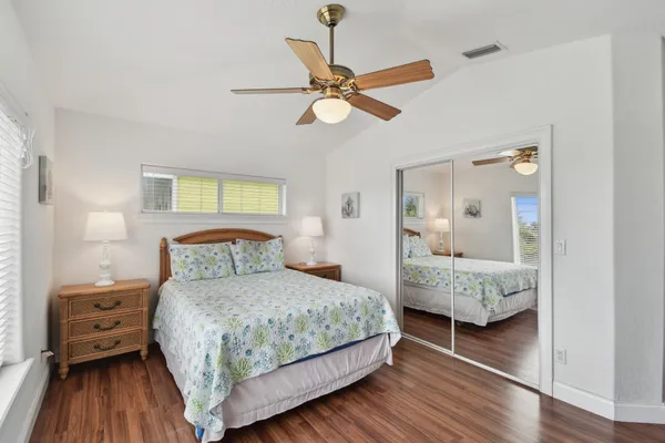 a view of a two chairs and table in the balcony