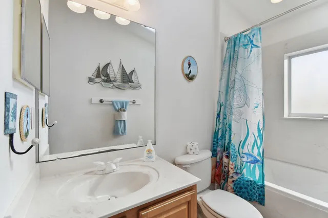 an aerial view of houses with yard