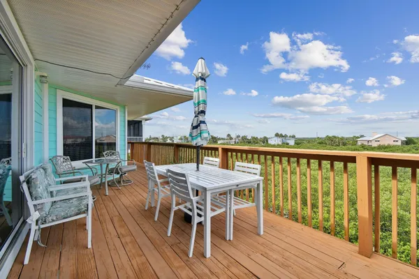 a view of a back yard of the house