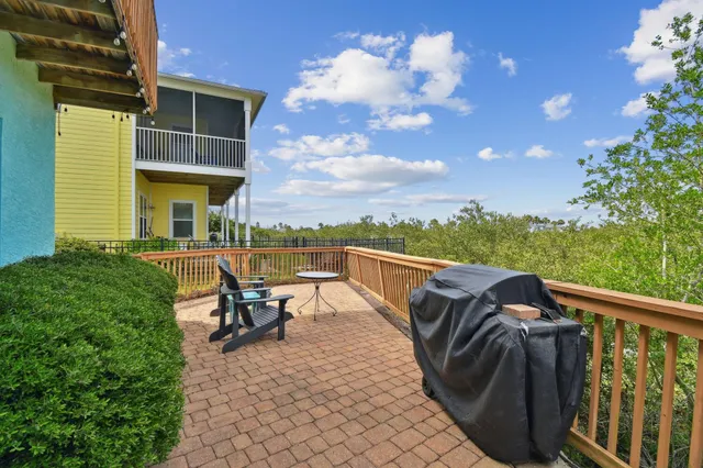 a view of a field with an ocean