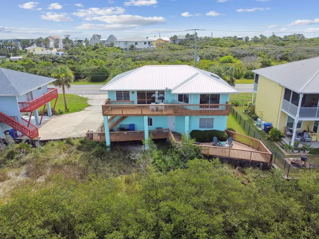 a view of a field with an ocean