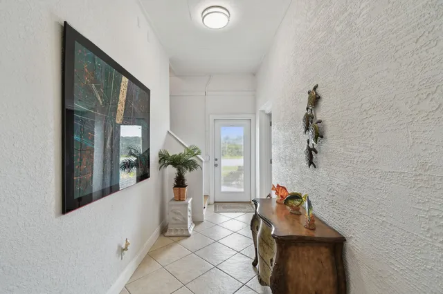 a bedroom with a bed and dresser