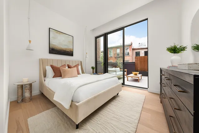 a kitchen with a sink a table and chairs